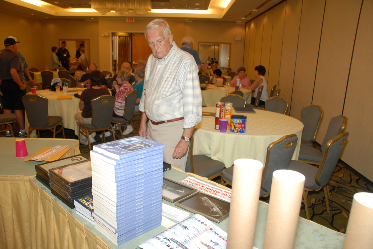 Allen Thurber checking out the books