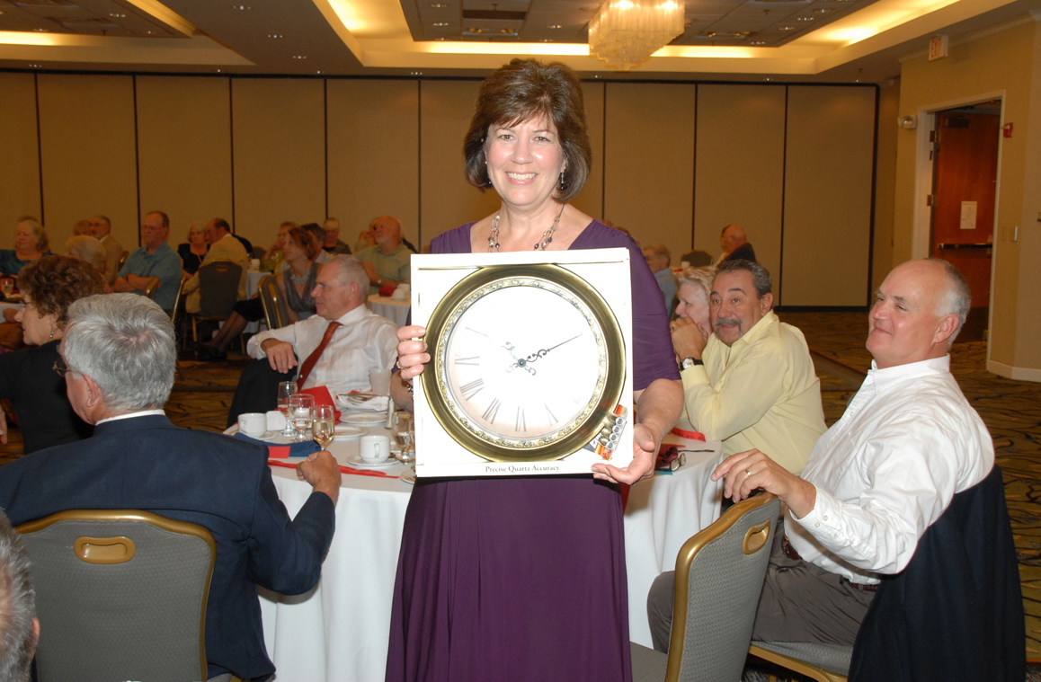 Debbie Flerlage winning a clock